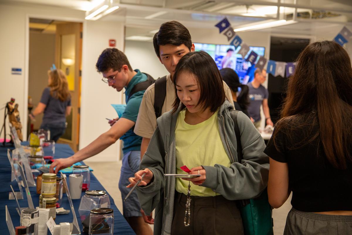 I&E Fest attendees visited the newly opened Luby Family Bullpen and bid on raffle items donated by Duke entrepreneurs