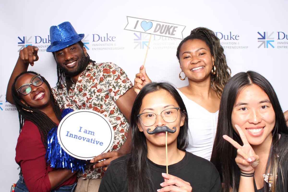 Students at I&E Fest pose in the photo booth