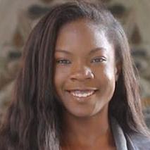 Seun Okimi headshot