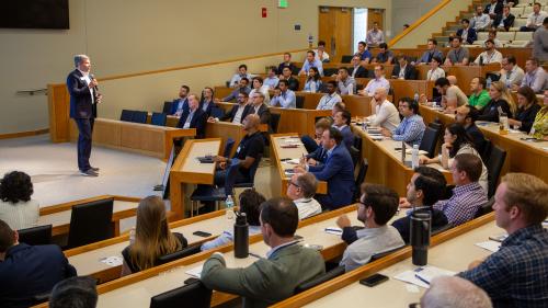 Ben Thomason addresses the crowd in Geneen Auditorium at the 2023 Southeastern Entrepreneurship Through Acquisition Conference